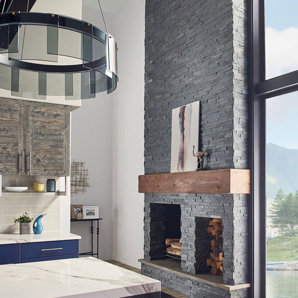 Stacked stone veneer panels installed on an outdoor BBQ column with mixed earthy tones