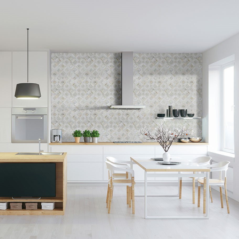 Kitchen backsplash made from white marble mosaic tiles with subtle veining