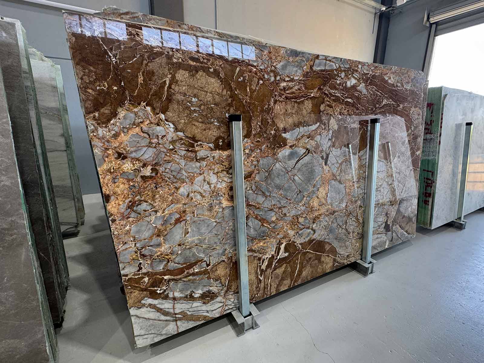 Copper River Marble Slab in polished finish showing copper, bronze, and gray tones