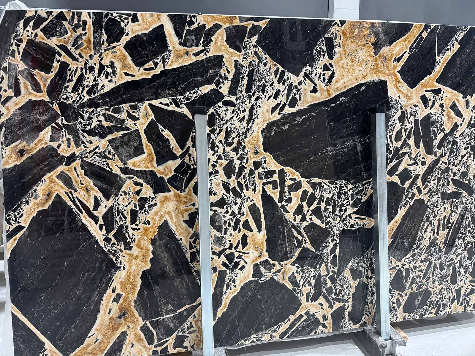 Serengeti Leopard Marble Slab showing golden and ivory veins