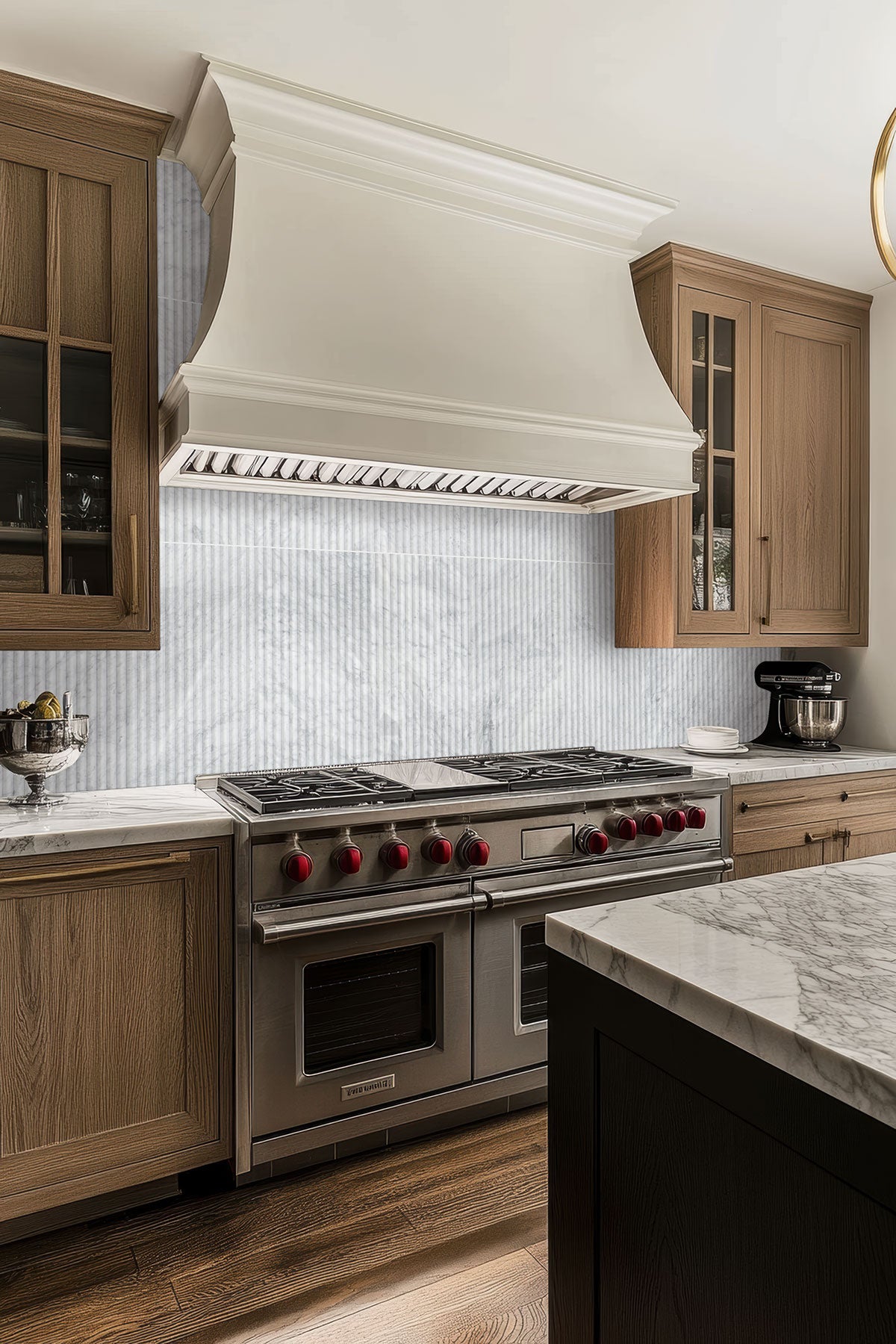 Carrara White Milano Ribbo Marble Tiles installed on kitchen wall with honed finish