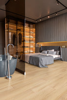 Folk Charcoal Fluted Tiles installed on bedroom wall with matching grout