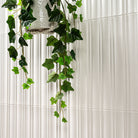 Folk Pearl Fluted Tiles installed on living room wall with seamless, refined finish