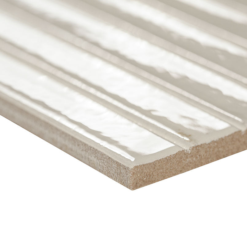 Edge of Gems Bianco showing glossy surface and linear fluted texture