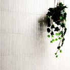 Gems Bianco Fluted Tiles installed on feature wall with seamless grout finish