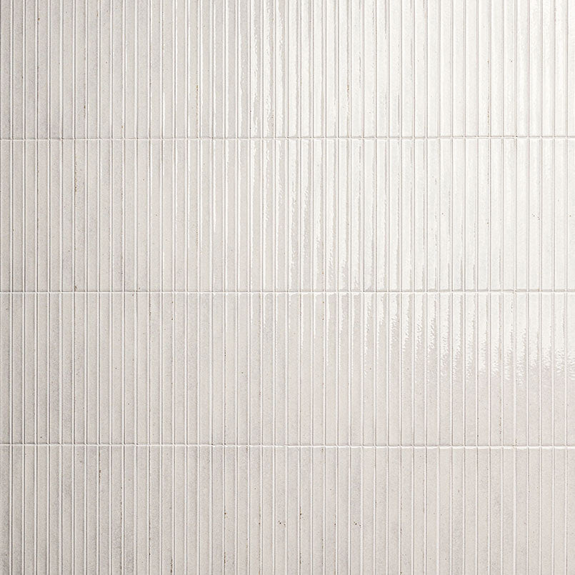 Flat view of Gems Bianco Fluted Tile, 5x10 porcelain with glossy finish and pre-scored slat design