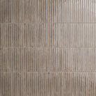 Flat view of Gems Grigio Fluted Tile, 5x10 porcelain with glossy finish and pre-scored fluted design