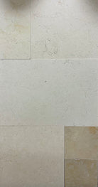 Flat layout of Jerusalem Gold Limestone Versailles pattern tiles in warm gold and taupe tones