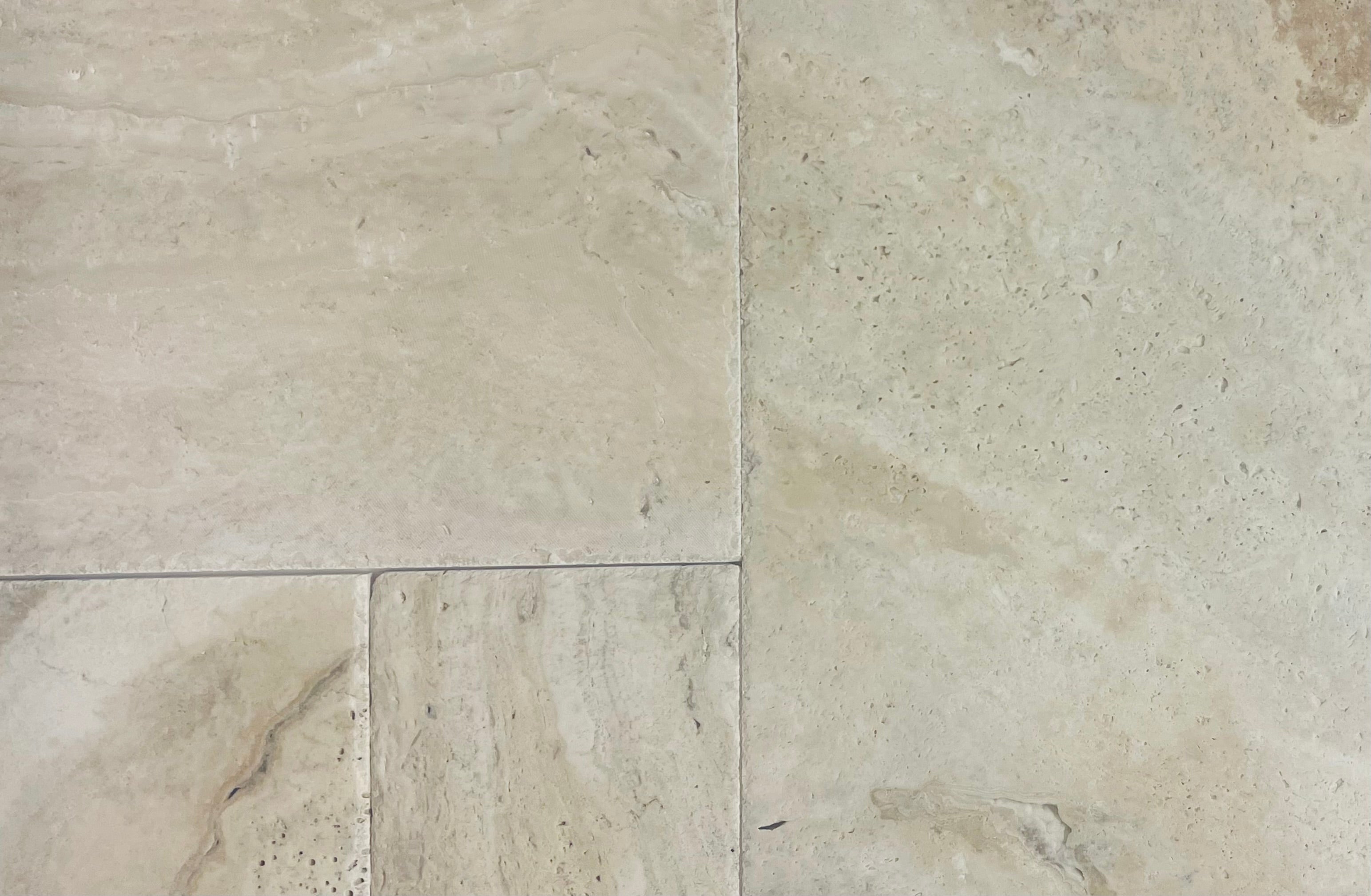 Navona Travertine Versailles tile pattern featuring soft neutral tones and chiseled edges