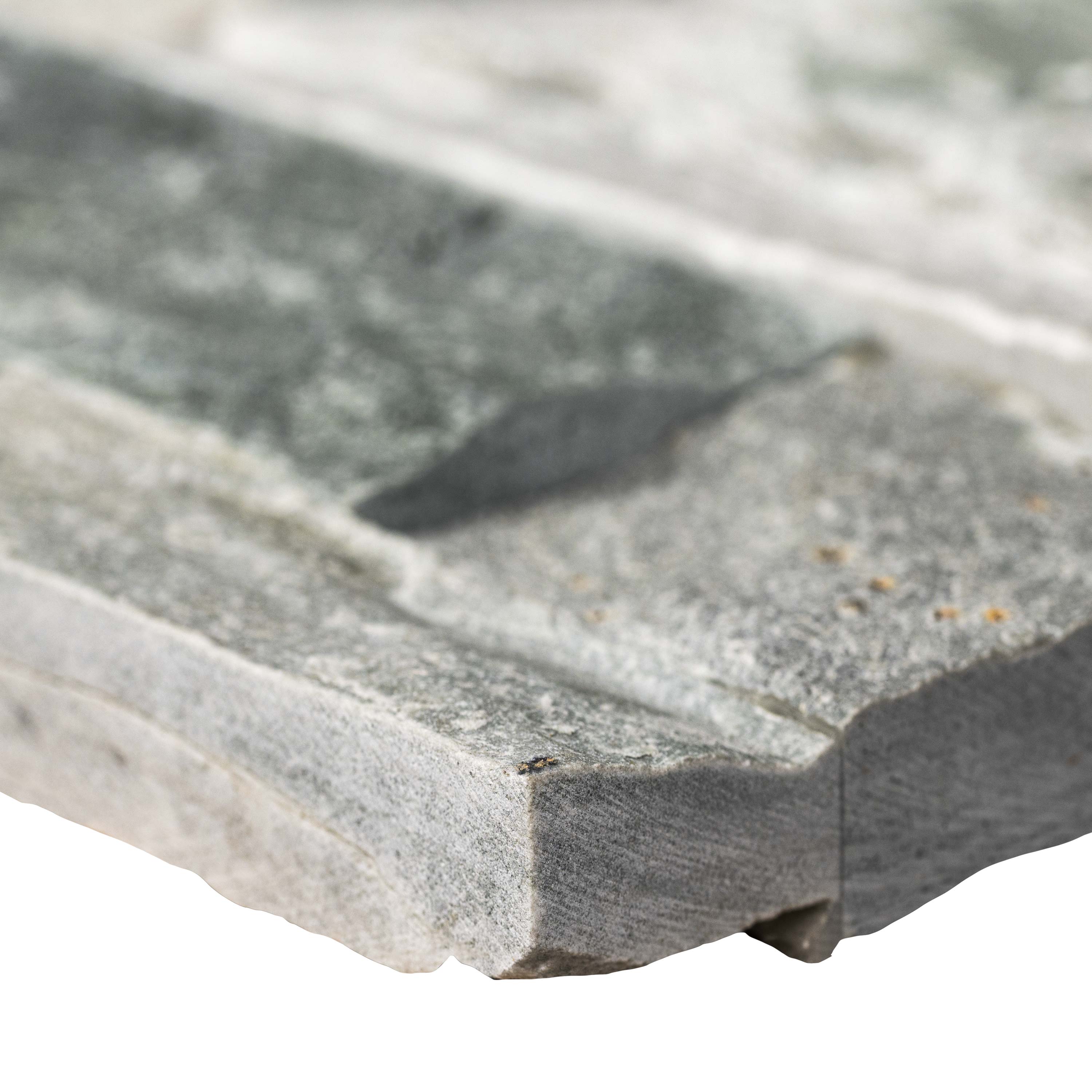 Close-up of Sierra Blue Quartzite showing natural split-face texture and multicolor pattern