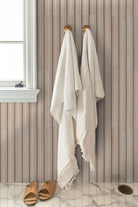 Sinfonia Hip Hop Abedul Fluted Tiles installed on bathroom wall with soft matte finish