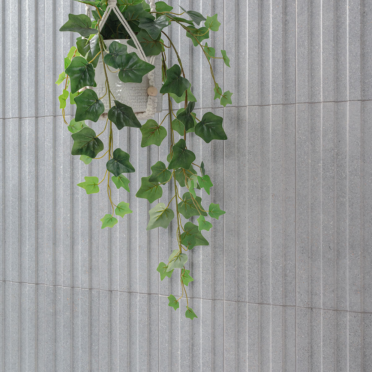 Sinfonia Hip Hop Ceniza Fluted Tiles installed on a wall with seamless, elegant finish