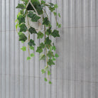 Sinfonia Hip Hop Ceniza Fluted Tiles installed on a wall with seamless, elegant finish