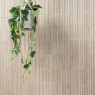 Sinfonia Piano Abedul Fluted Tiles installed on modern wall with seamless vertical layout