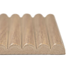 Close-up of Sinfonia Piano Camel showing fluted 3D design and warm brown tones