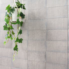 Sinfonia Piano Ceniza Fluted Tiles installed on a wall with elegant vertical layout