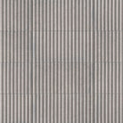 Flat view of Sinfonia Piano Ceniza Fluted Tile, 4.5x9 with matte finish and gray limestone-look texture