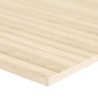 Close-up of Urbanslat Blonde Panel showing ribbed wood-look surface and warm tones