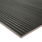 Edge of Urbanslat Carbon Panel showing ribbed 3D texture and matte surface