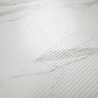 Close-up of Urbanslat Marmi Grey showing 3D fluted texture and satin finish