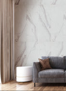 Urbanslat Marmi Grey Wall Panels installed onliving room feature wall with clean vertical flow