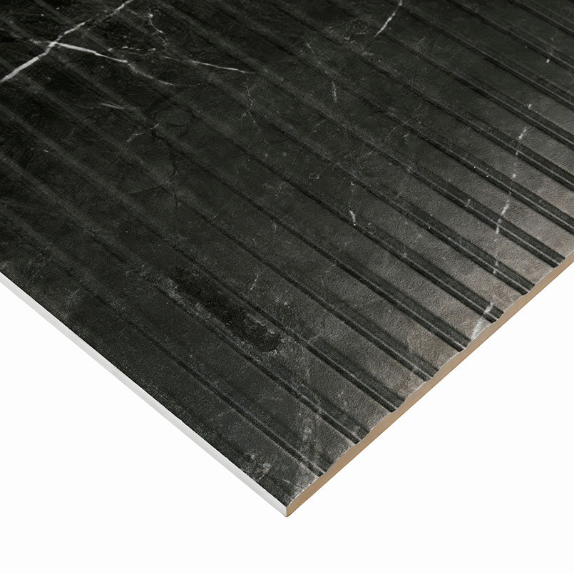 Edge of Urbanslat Marmi Noir showing fluted 3D texture and black surface with white veining