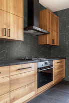 Urbanslat Marmi Noir Wall Panels installed on kitchen wall with sleek, seamless vertical layout