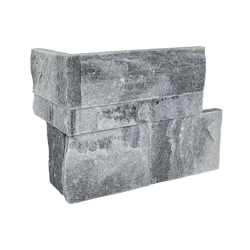 Flat view of XL Rockmount Alaska Gray 9x18 Corner with split-face marble texture in soft gray tones