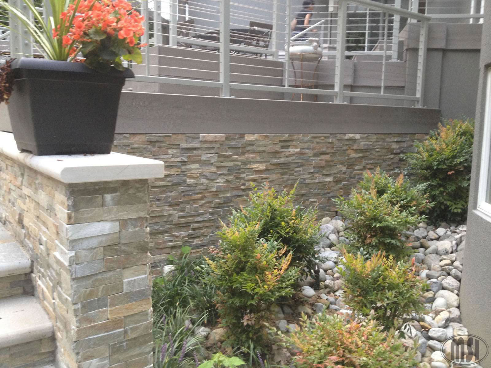 XL Rockmount Golden Honey Corners installed on an outdoor wall with seamless wrap-around finish