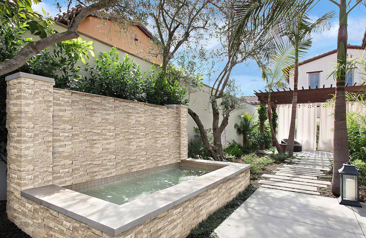 XL Rockmount Roman Beige Corners installed on exterior wall for a seamless, polished finish