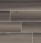 Flat lay of Acazia Blackwood 6x36 porcelain tile showing linear gray veining