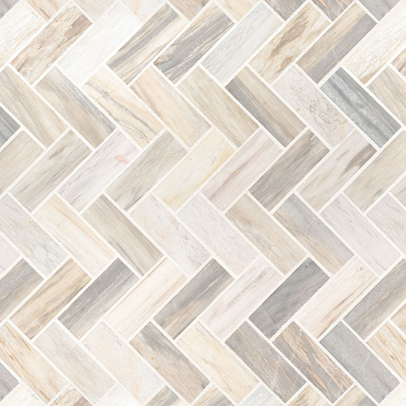 Flat lay of Angora Marble Herringbone mosaic showing beige and taupe tones