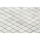 Close-up of Arabescato Carrara Marble in 1x2 diamond shape with polished finish