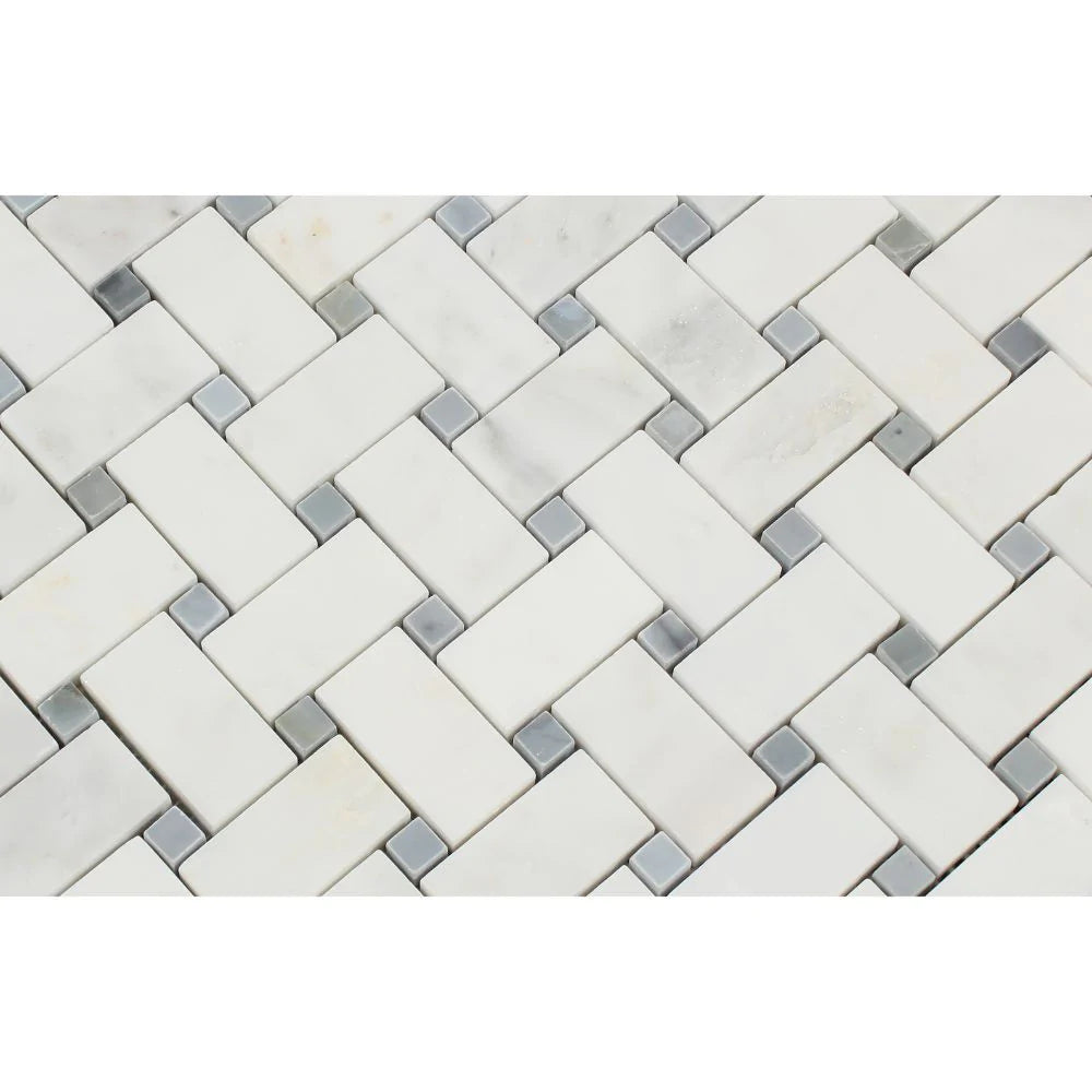 Close-up of Arabescato Carrara marble basketweave mosaic with blue dots