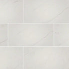 Flat lay of Aria Ice porcelain tile in polished finish with soft cream tones