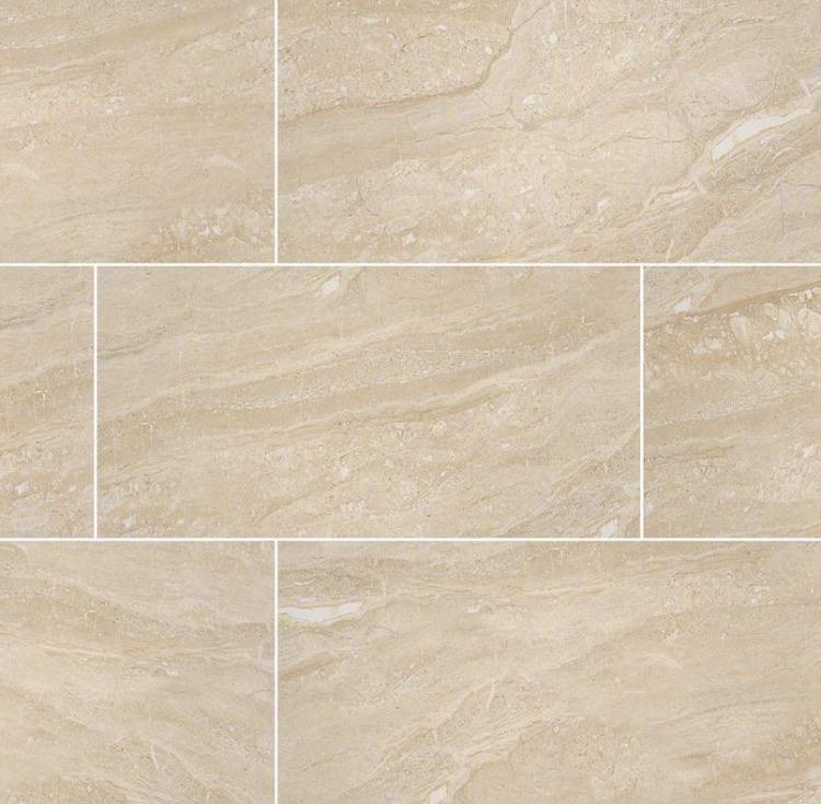 Flat lay of Aria Oro porcelain tile showing warm cream tones and polished stone look