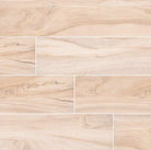 Flat lay of Aspenwood Arctic 9x48 wood-look porcelain tile in warm beige tones