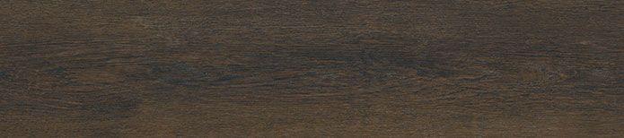 Close-up of Barrel LVT showing realistic walnut-style wood knots and matte texture