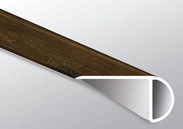 Close-up of Barrel LVT showing realistic walnut-style wood knots and matte texture