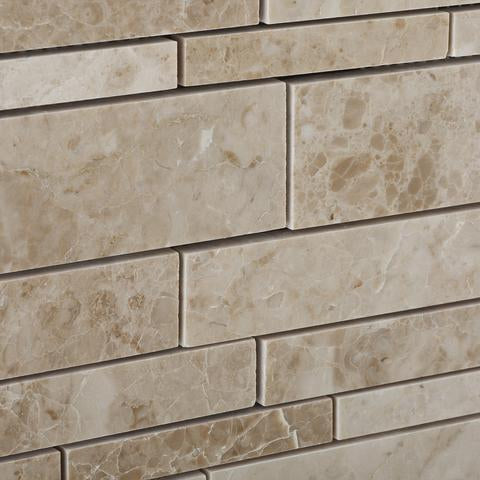 Close-up of Cappuccino marble strip mosaic showing natural variation