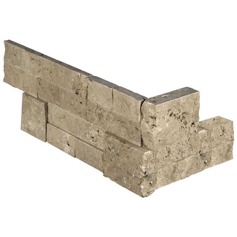 Top view of Cordoba Noche small corner travertine ledger with warm brown tones and split face texture