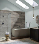 Close-up of Country River Stone porcelain tile showing weathered knot details and fine grain texture