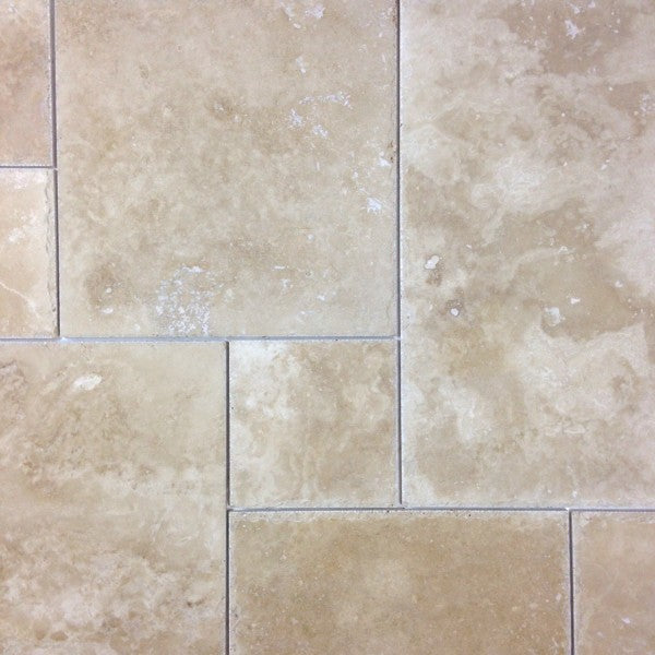 Flat view of Crema Ivory Travertine Versailles Pattern with brushed and chiseled finish"