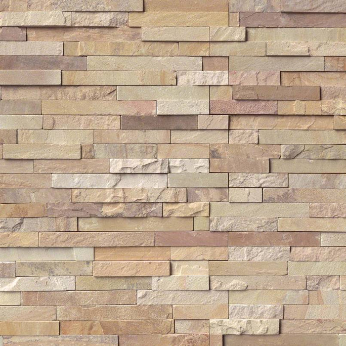 Flat lay of Fossil Rustic sandstone stacked stone panel with grays, creams, and rust accents
