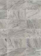 Close-up of white porcelain tile with subtle gray marble veining