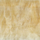 Close-up of Honey Onyx polished surface and microbeveled edge on 18x18 tile