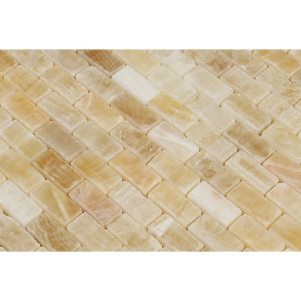 Close-up of 5/8x1 polished Honey Onyx mosaic showing fine detail and golden veining