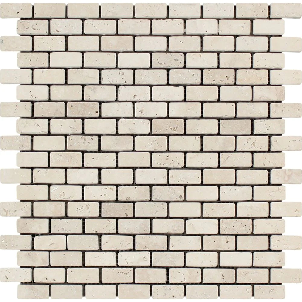 Flat view of Ivory Travertine 5/8"x1" Tumbled Mosaic on 12"x12" mesh, showing cream and beige color variation