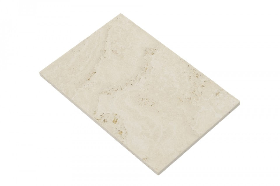 Flat view of Ivory Travertine Paver 16x24 with brushed finish
