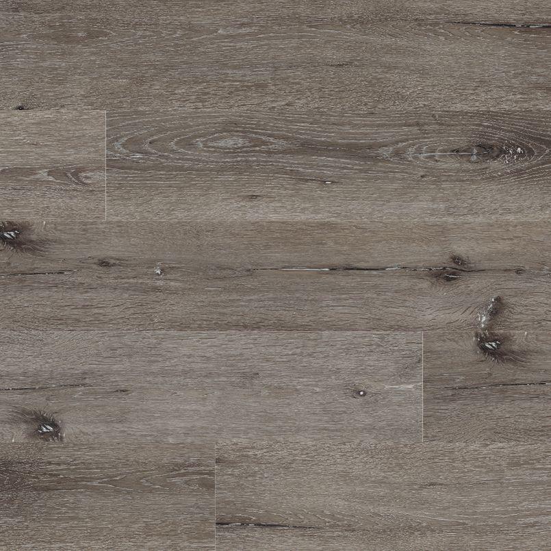 Flat lay of Ludlow Luxury Vinyl Tile showing soft gray base with realistic charcoal wood grain